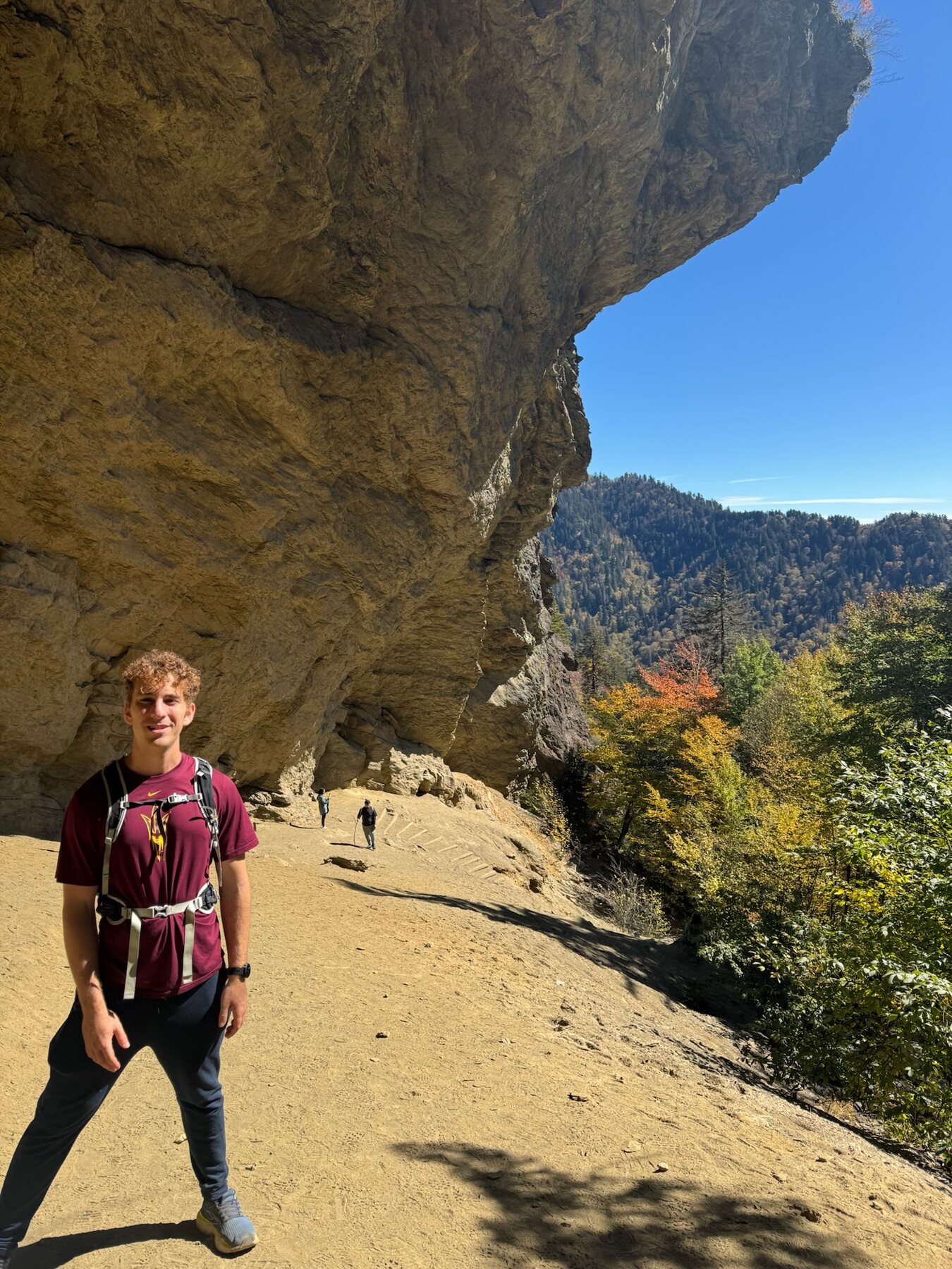 Zach beneath a rock overhang on Alum Cave Trail