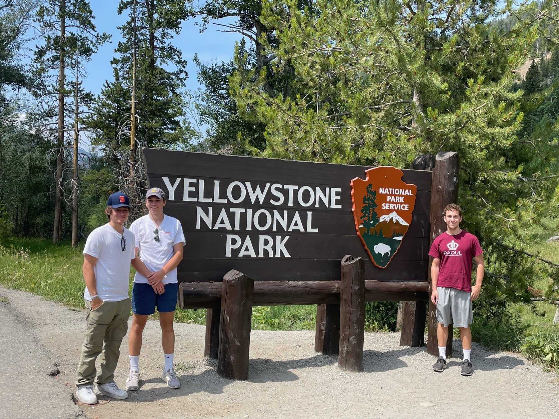 Zach and friends at the Yellowstone National Park entrance